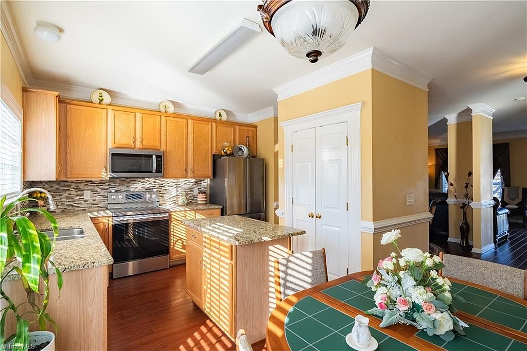 dcc7fe42f3295249bd9701b5c39e17d0-cc_ft_1536 Wonderful 4-bedroom, 2.5-bath family home situated on a corner lot in Greensboro.